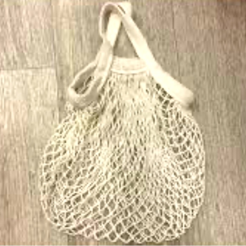 EUC The Sak cute crochet mini cream colored bag
